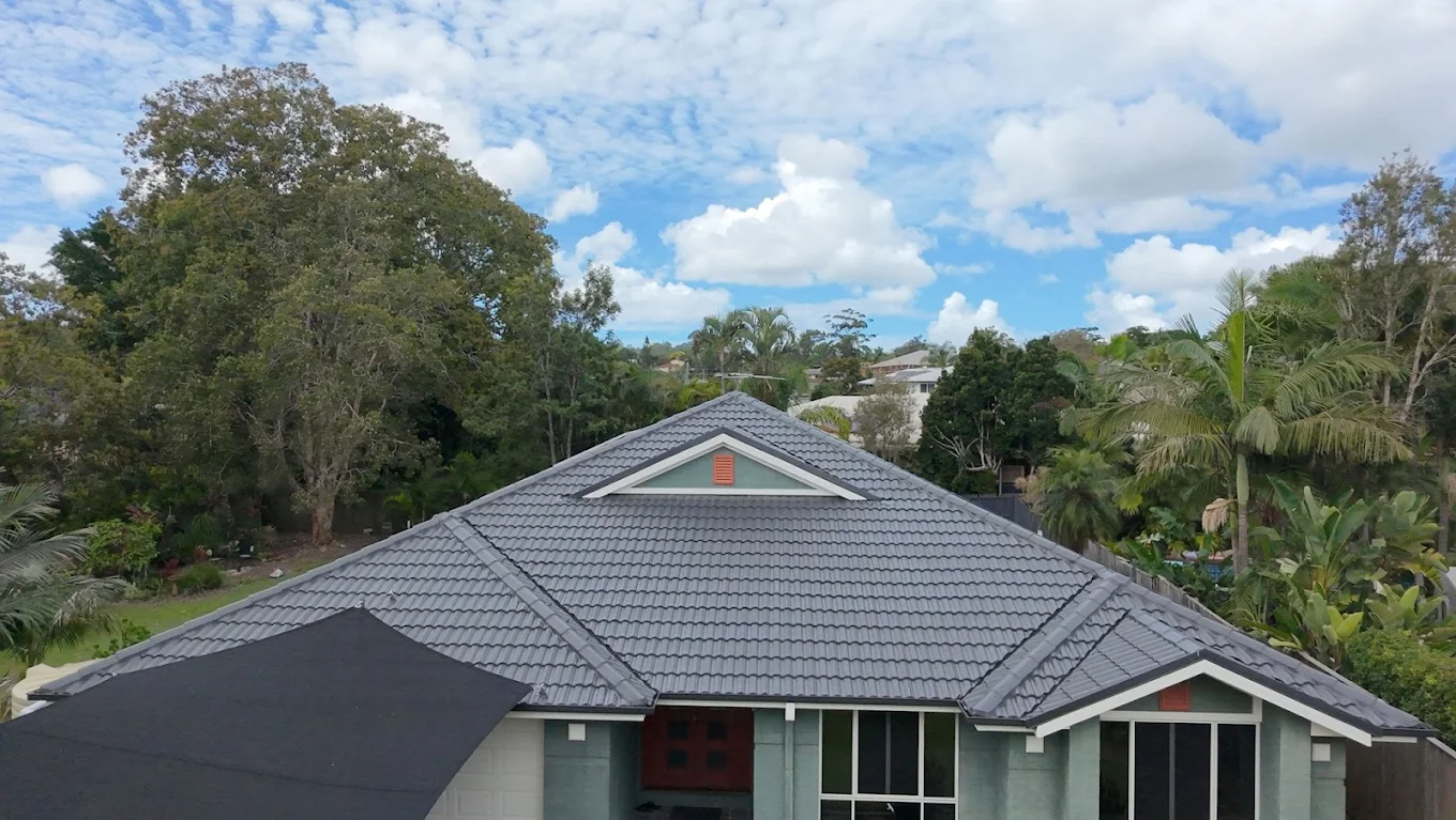 Roof painting and exterior house repaint project by Up and Downs Painting in Brisbane