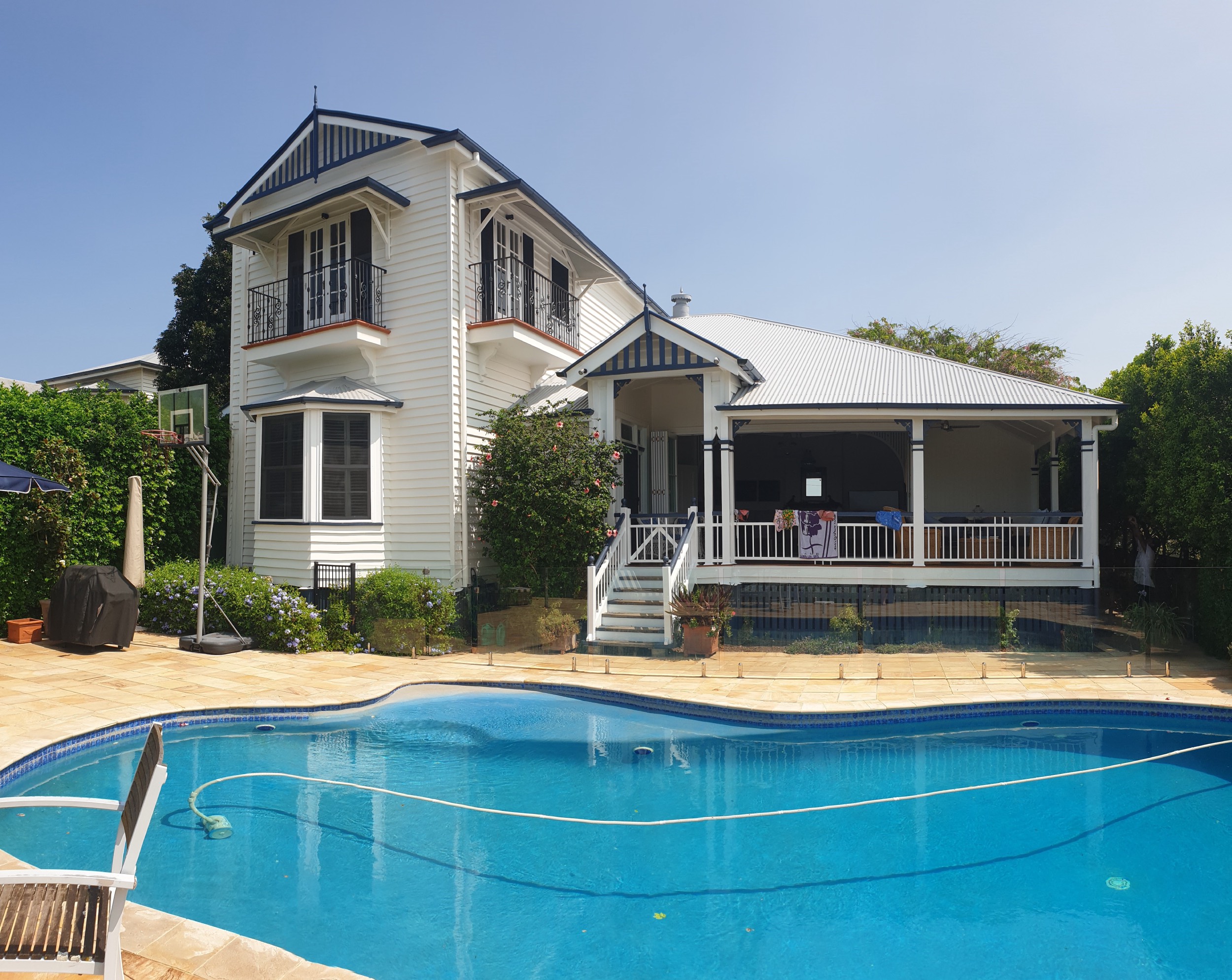 Roof painting and exterior house repaint project by Up and Downs Painting in Brisbane